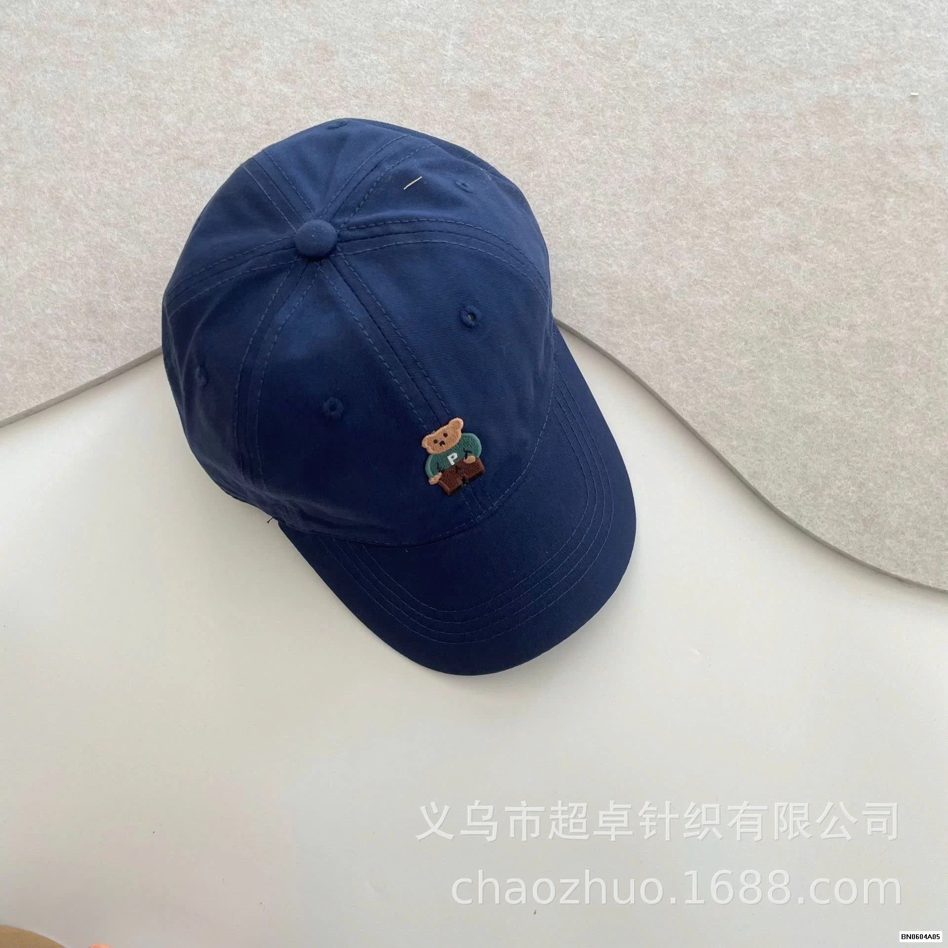 MŨ KẾT THÊU LOGO GẤU