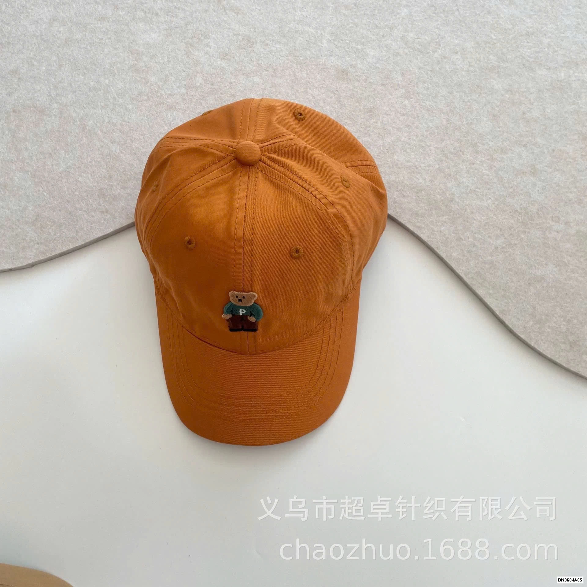 MŨ KẾT THÊU LOGO GẤU