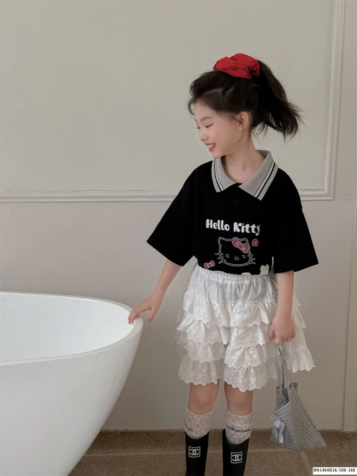 CHÂN VÁY TRẮNG REN TẦNG THÊU NƠ