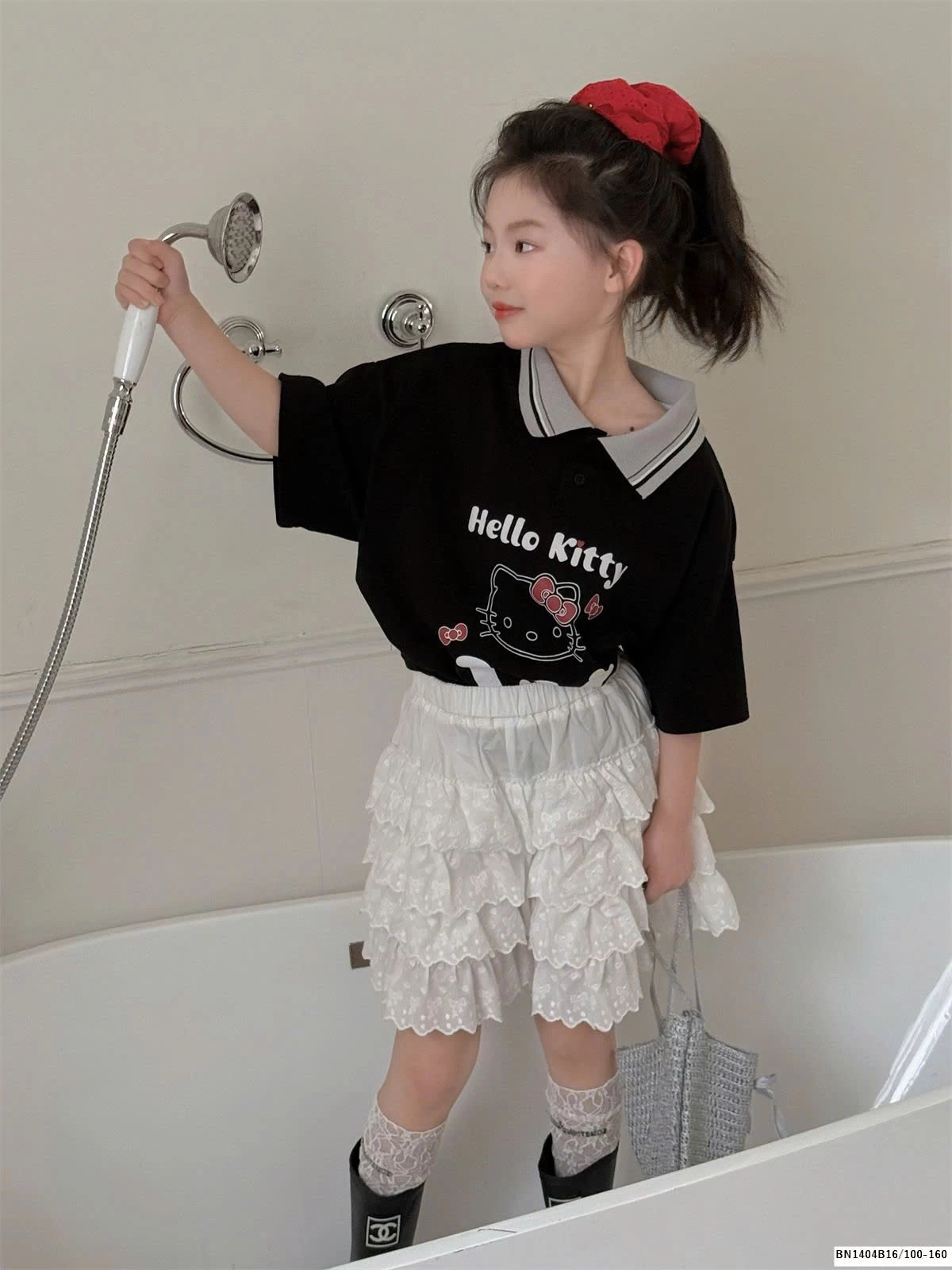 CHÂN VÁY TRẮNG REN TẦNG THÊU NƠ