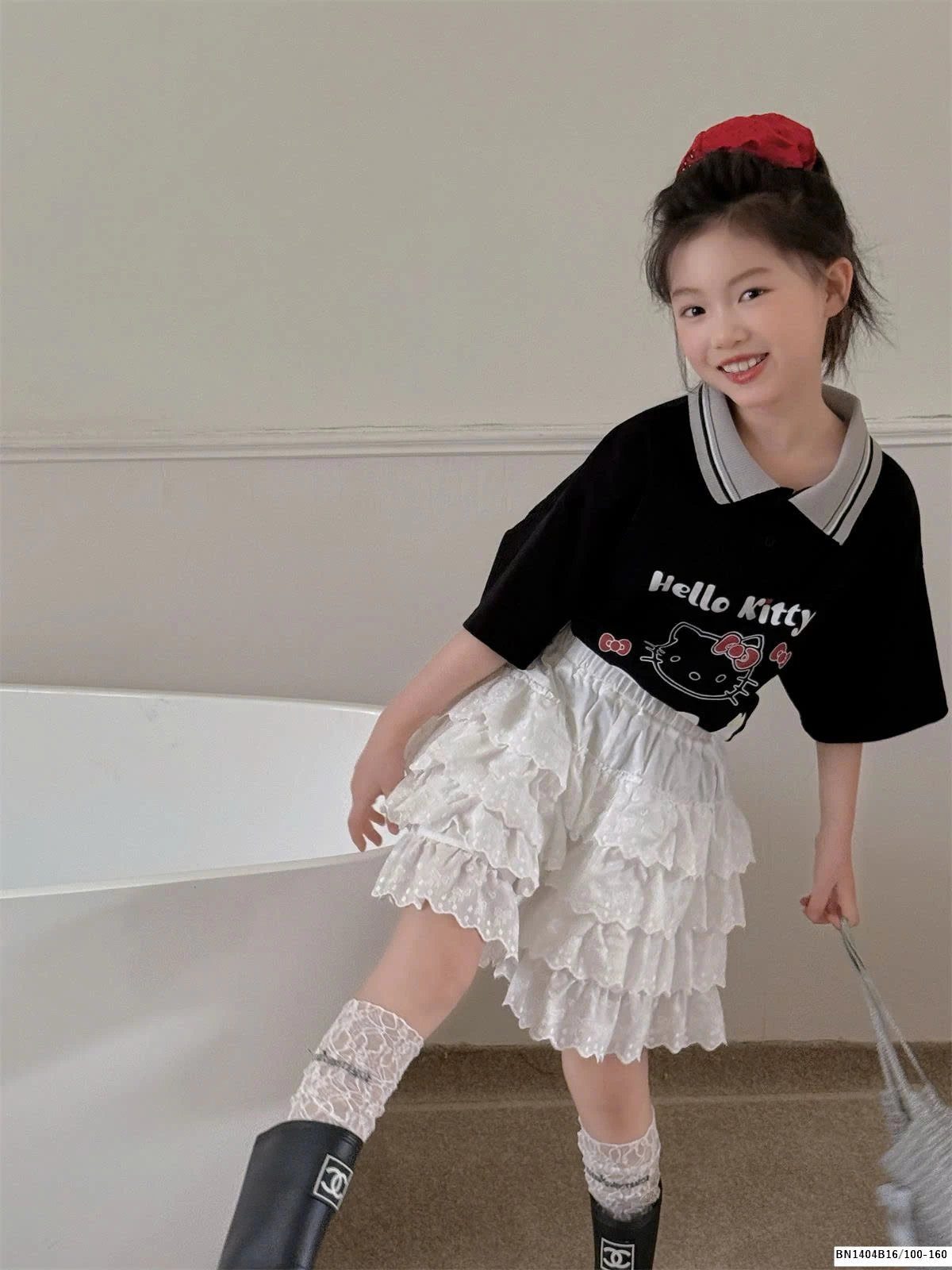 CHÂN VÁY TRẮNG REN TẦNG THÊU NƠ