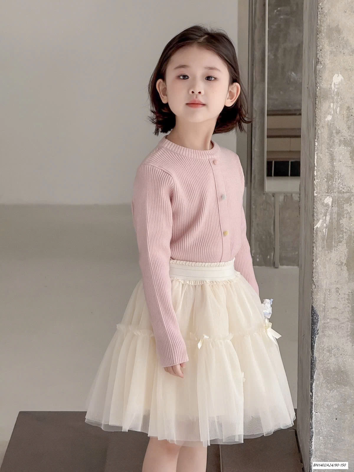 CHÂN VÁY VOAN BỒNG GẮN NƠ