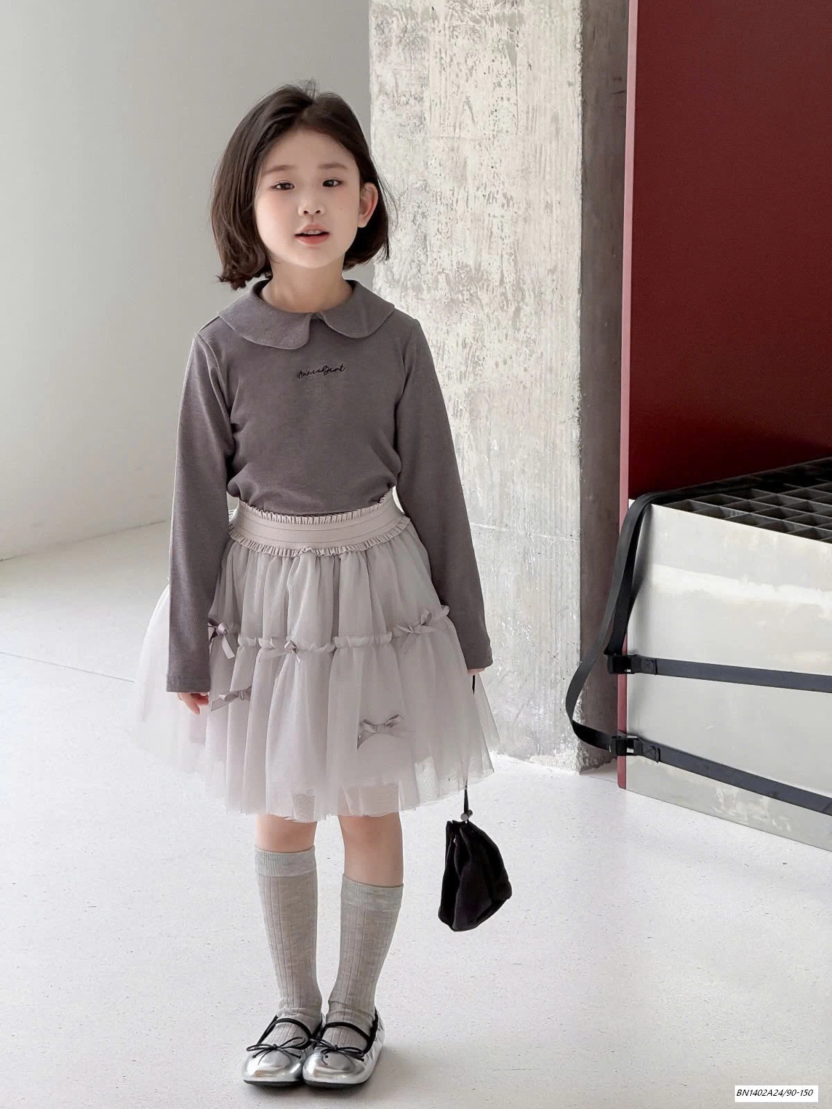 CHÂN VÁY VOAN BỒNG GẮN NƠ