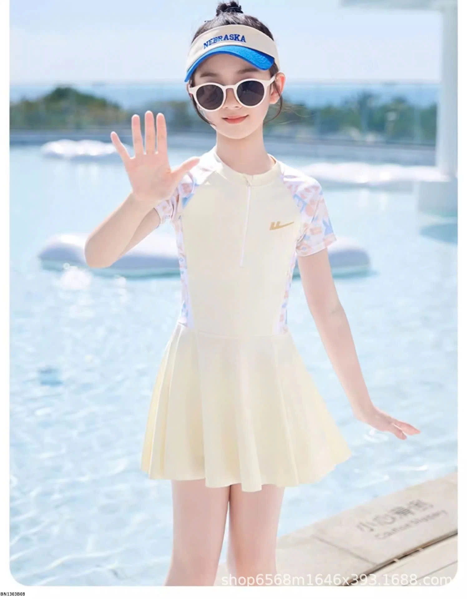 VÁY BƠI TRẮNG KEM BÉ GÁI