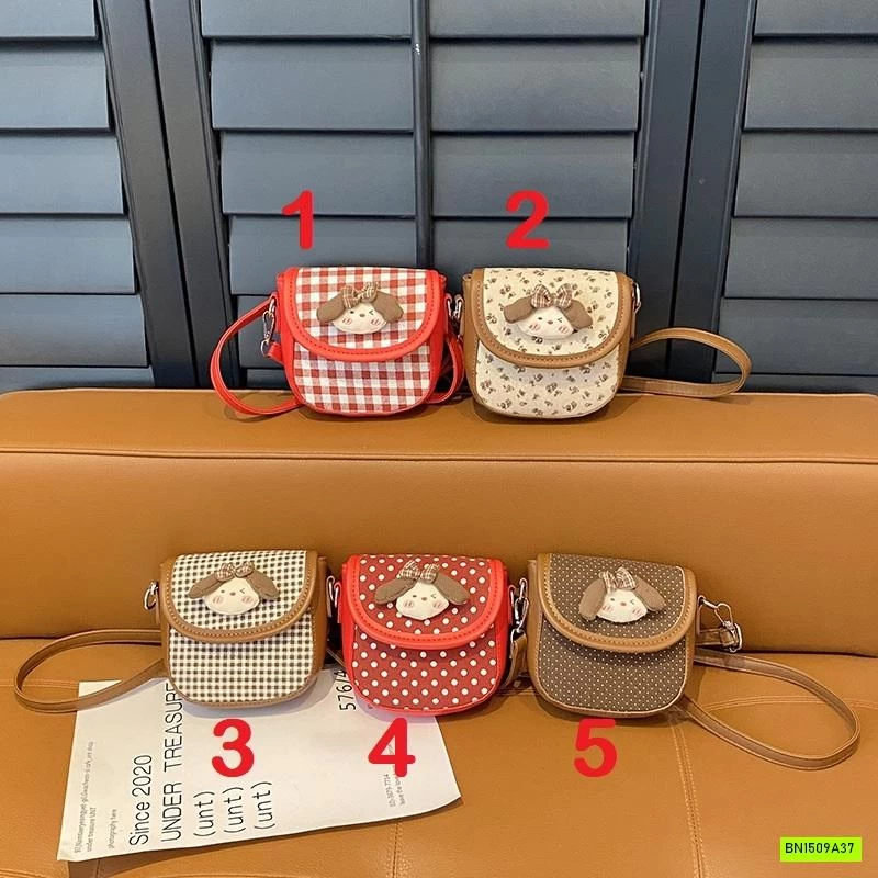 TÚI ĐEO CHÉO GẮN BÚP BÊ DỄ THƯƠNG