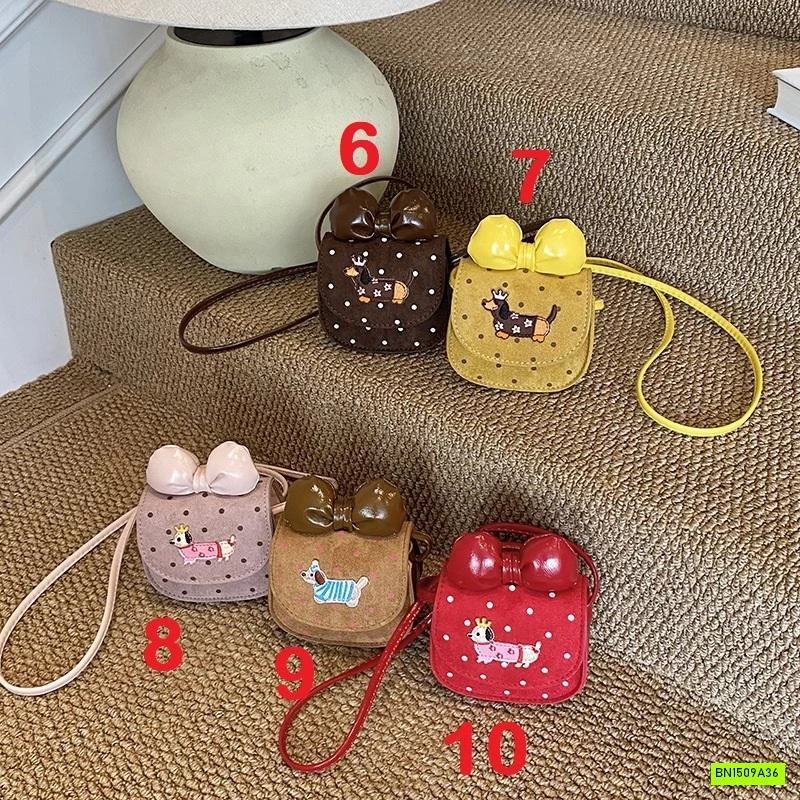 TÚI ĐEO CHÉO DA LỘN MINI GẮN NƠ