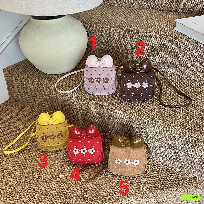 TÚI ĐEO CHÉO DA LỘN MINI GẮN NƠ