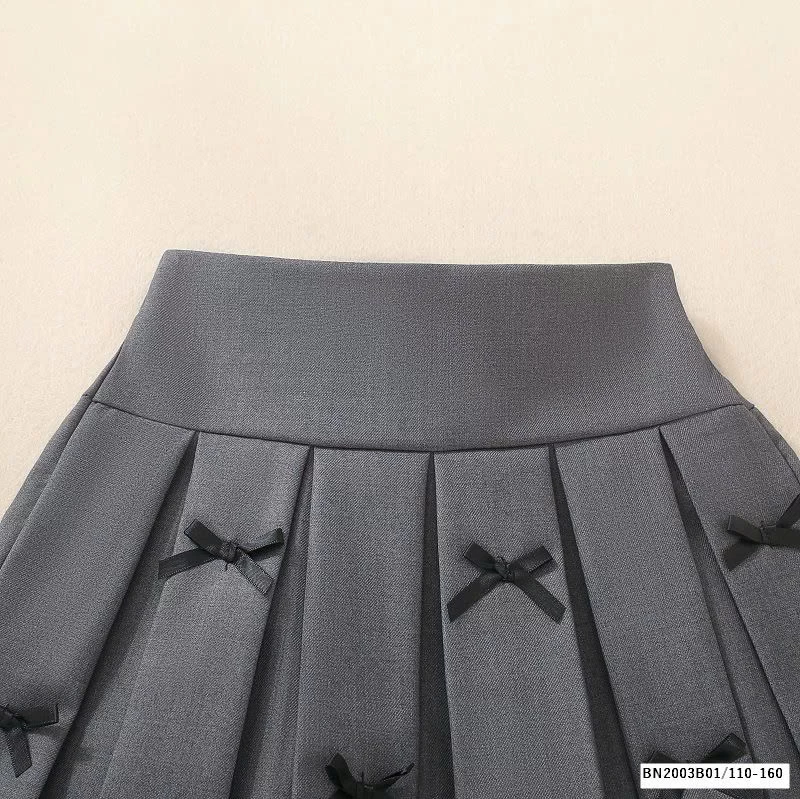 CHÂN VÁY XẾP LY NỮ SINH GẮN NƠ