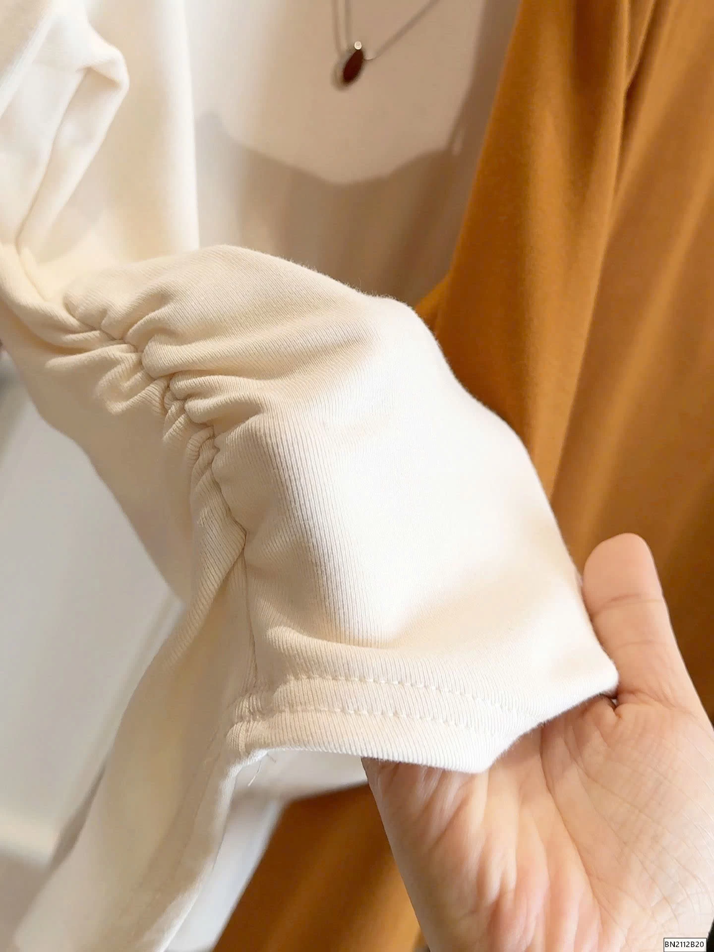 ÁO GIỮ NHIỆT RÚT EO