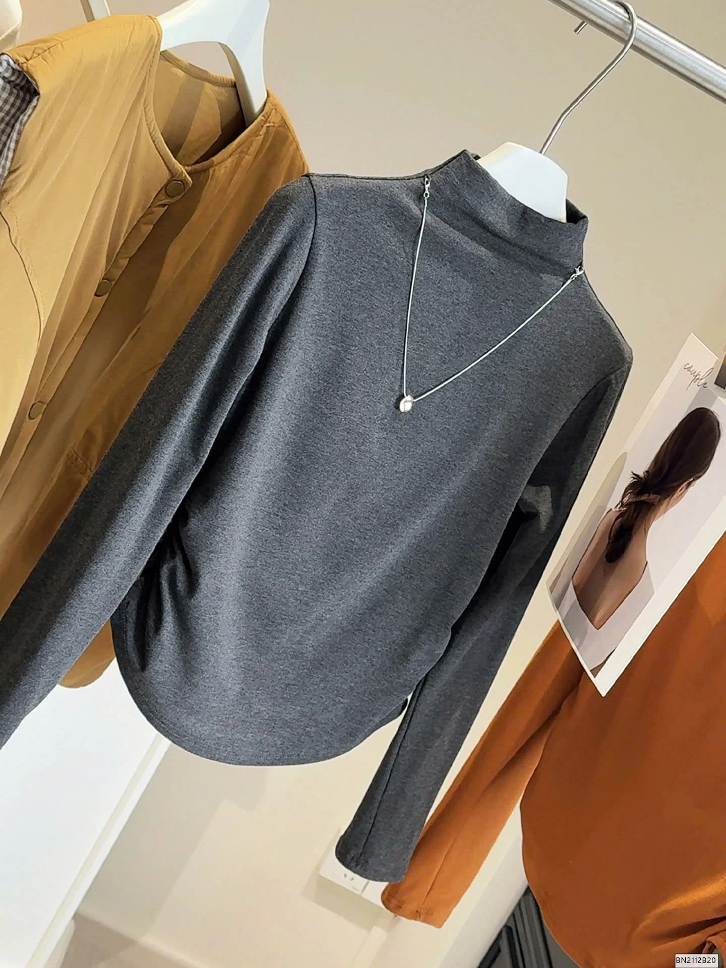 ÁO GIỮ NHIỆT RÚT EO