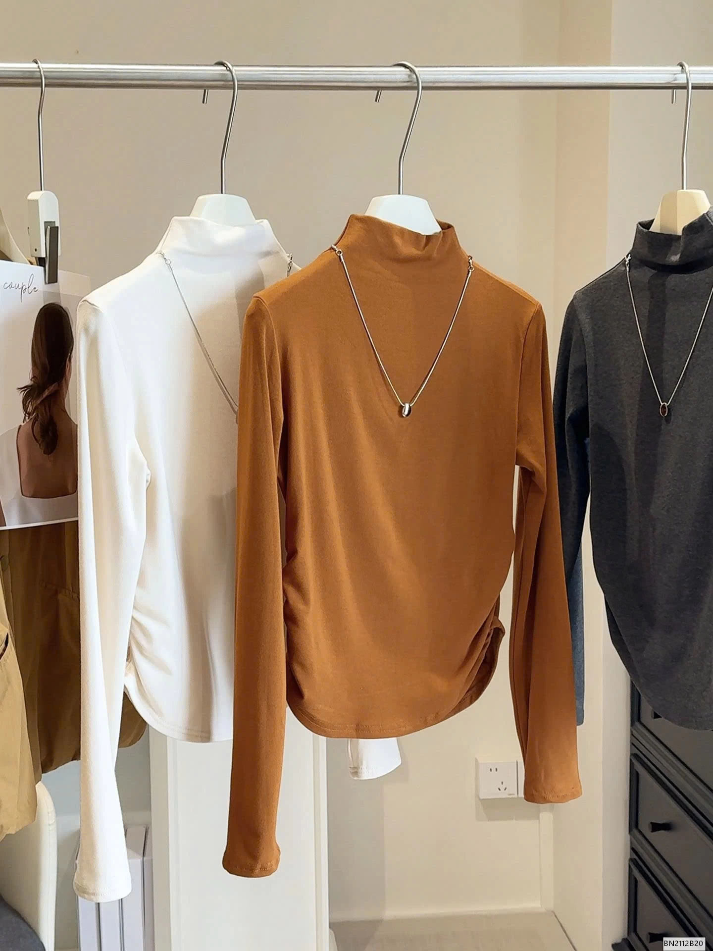 ÁO GIỮ NHIỆT RÚT EO