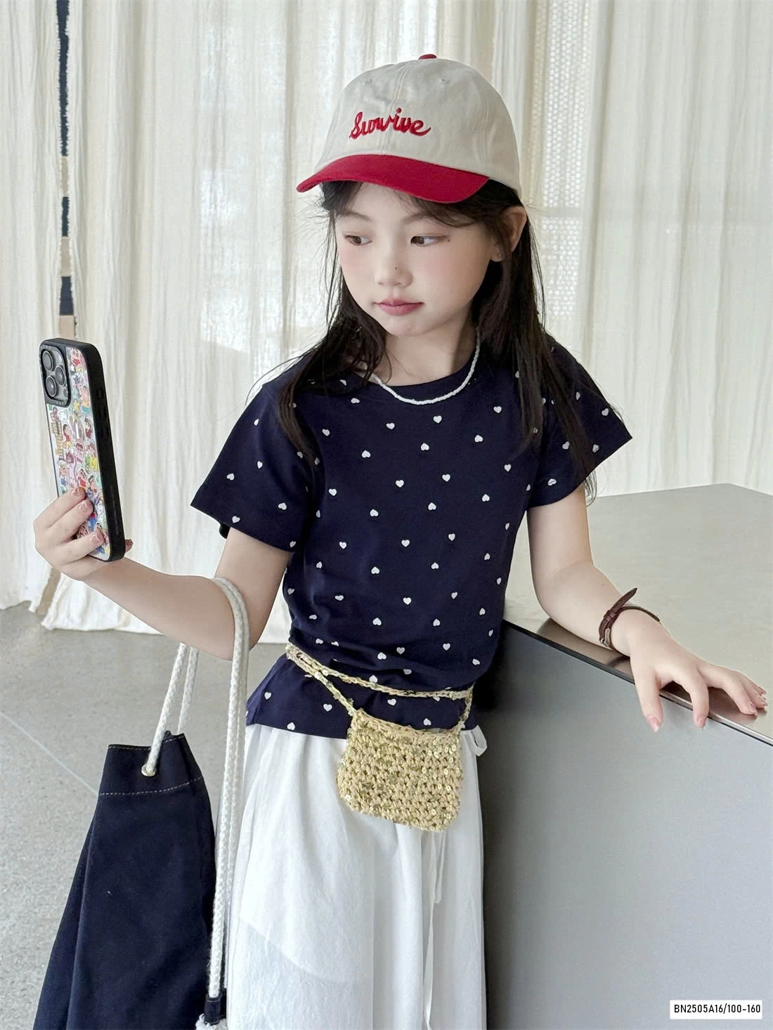 ÁO THUN CHẤM BI KHOÉT LƯNG