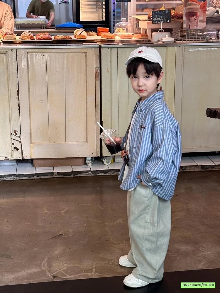 SƠ MI XANH SỌC THÊU LOGO 24X145 AMBB