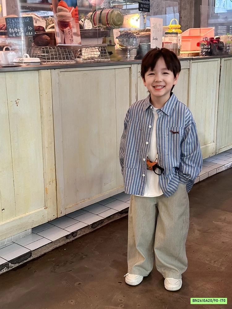 SƠ MI XANH SỌC THÊU LOGO 24X145 AMBB