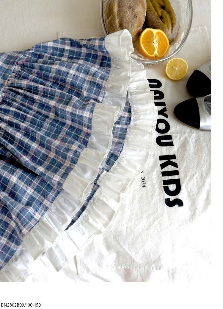 VÁY CARO XANH BÉ GÁI