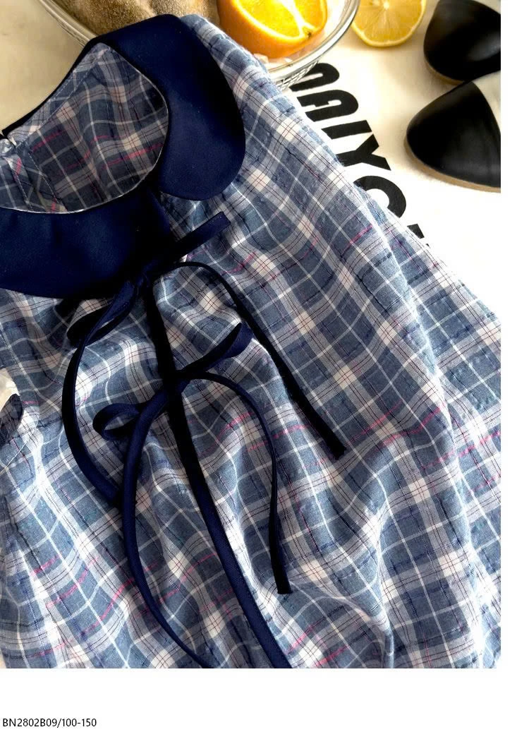 VÁY CARO XANH BÉ GÁI