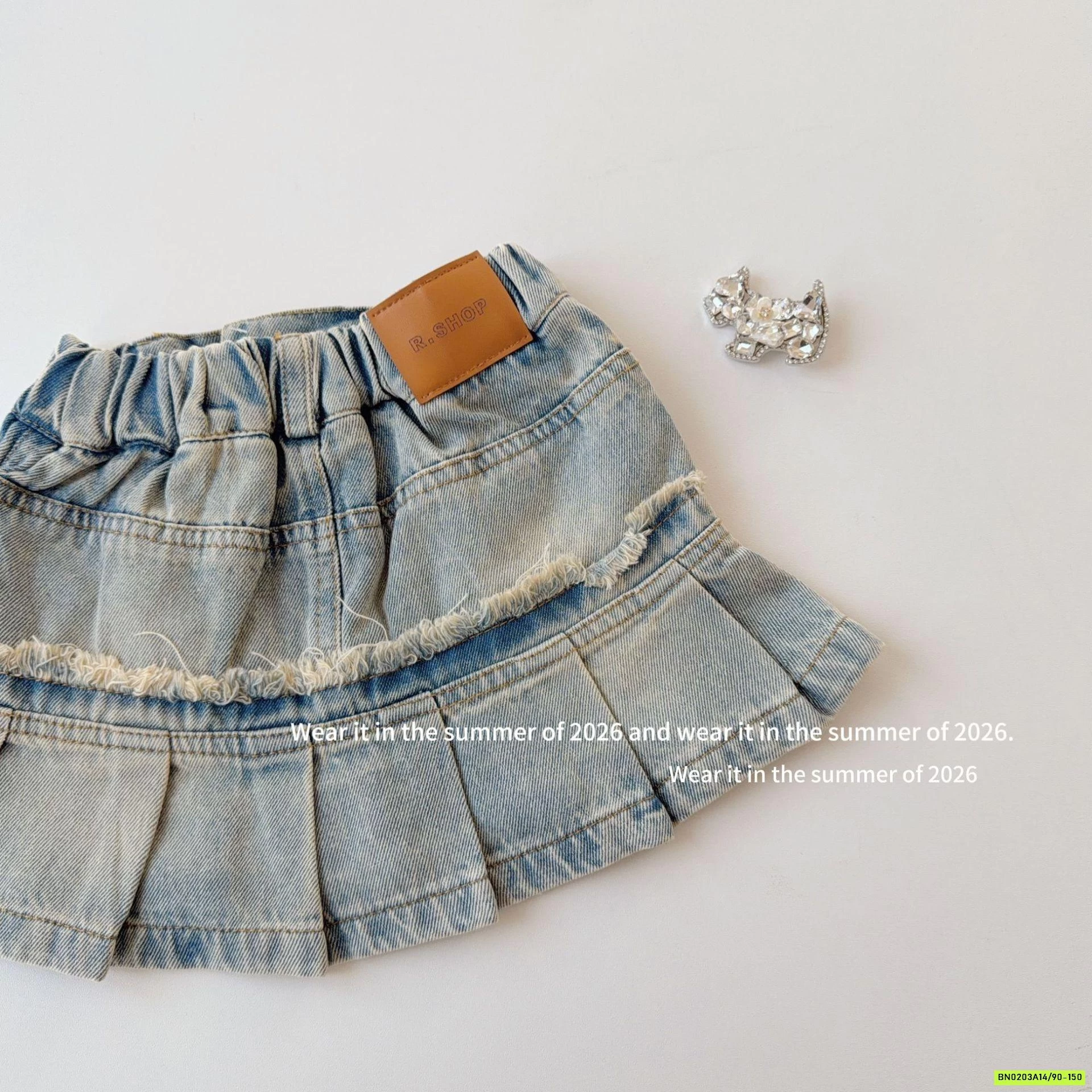 CHÂN VÁY JEANS XẾP LY TUA RUA T&QKIDS
