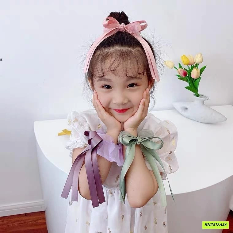 BUỘC TÓC GIẢ NƠ RUY BĂNG