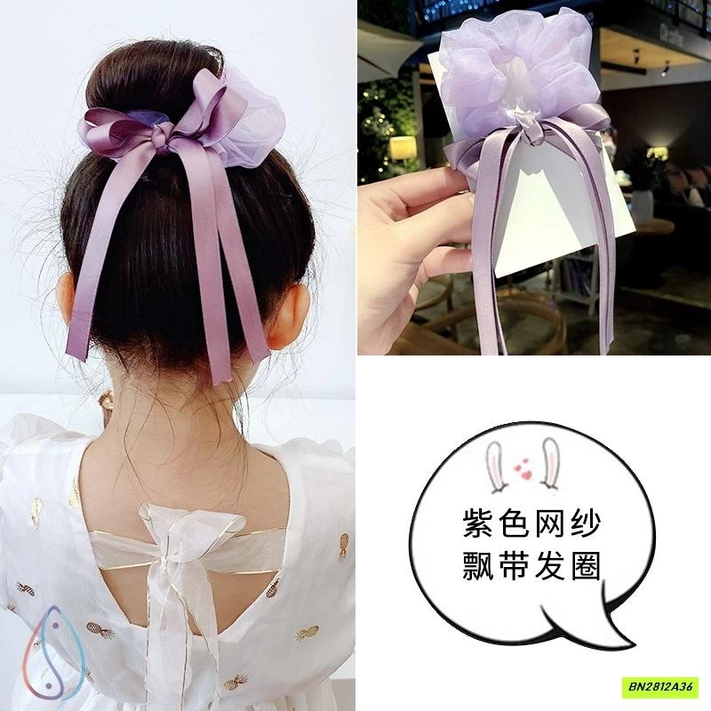 BUỘC TÓC GIẢ NƠ RUY BĂNG