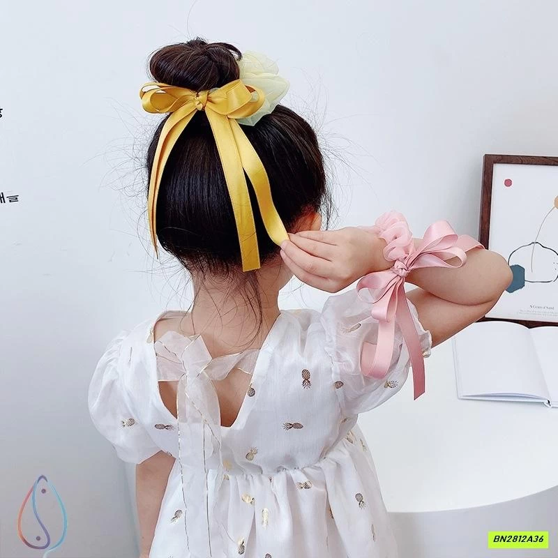 BUỘC TÓC GIẢ NƠ RUY BĂNG