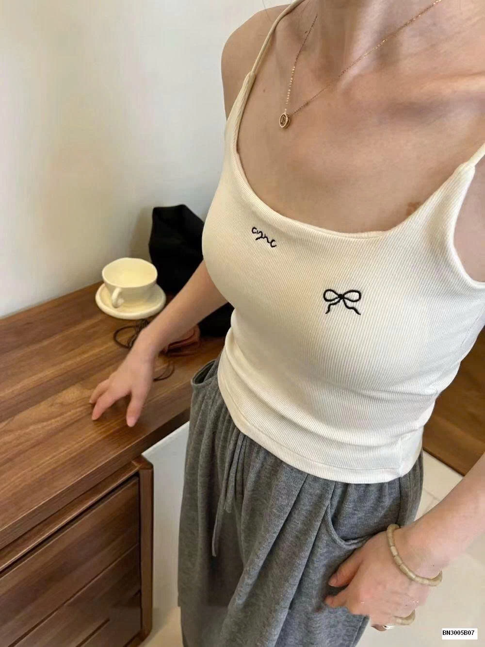 ÁO 2 DÂY HỌA TIẾT NƠ