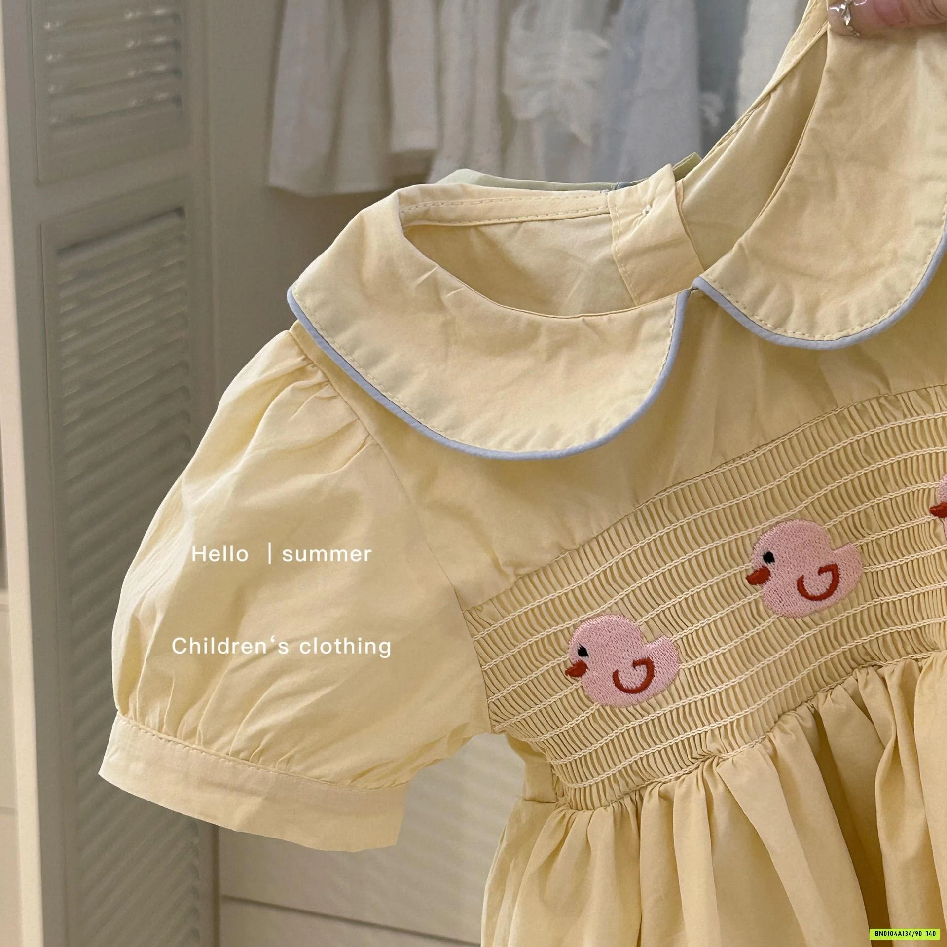 ĐẦM VÀNG TAY BỒNG THÊU VỊT