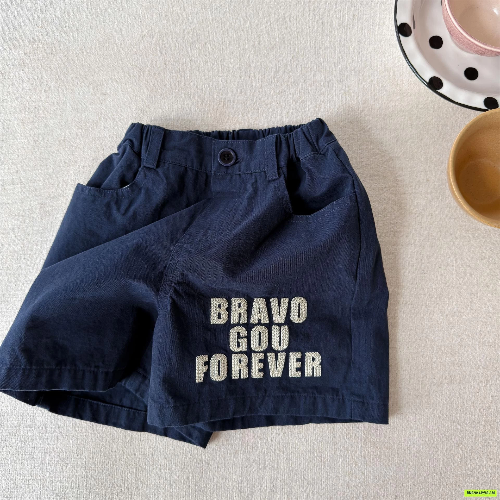 SHORT THÔ THÊU CHỮ ADBABY