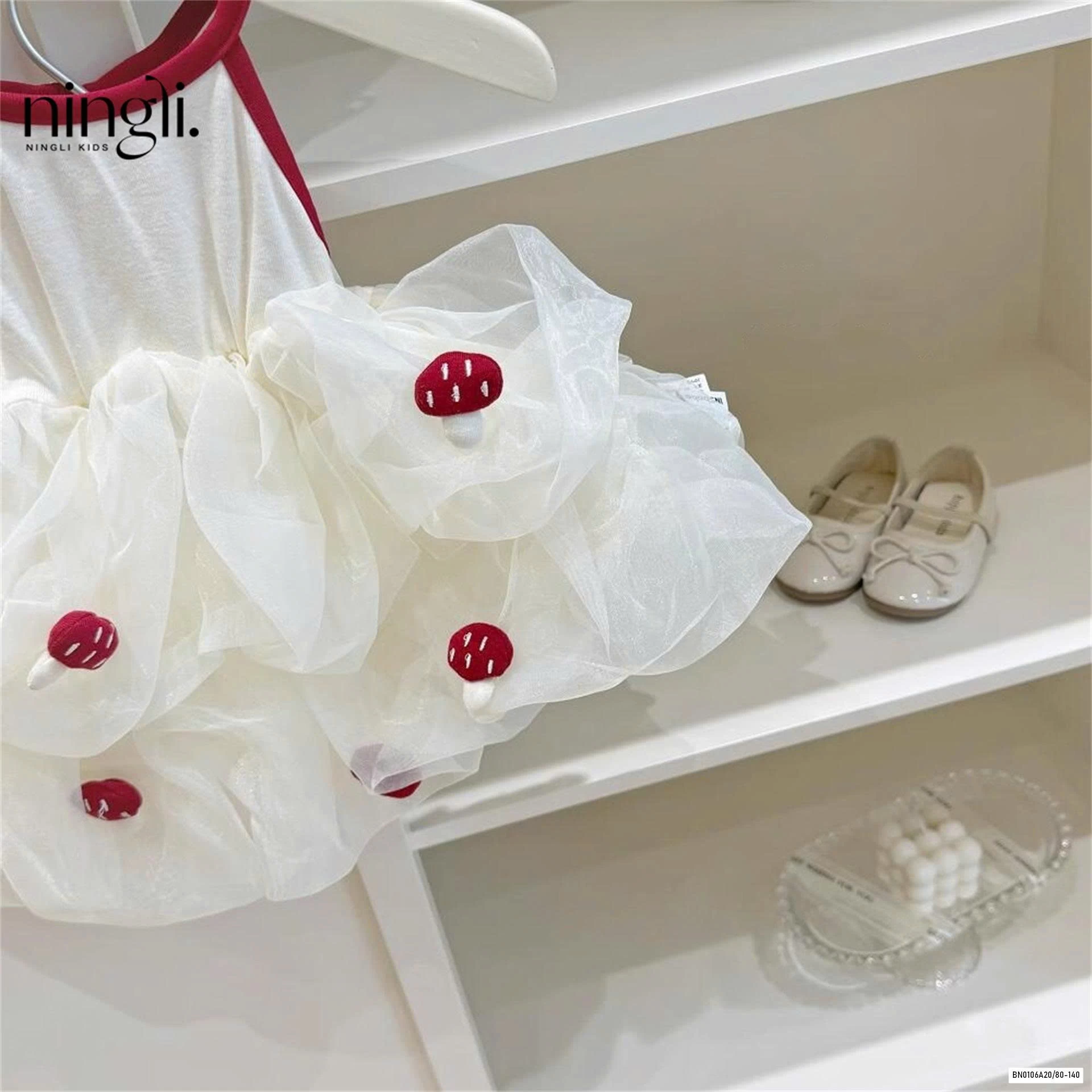 ĐẦM VOAN 2 DÂY GẮN DÂU TÂY