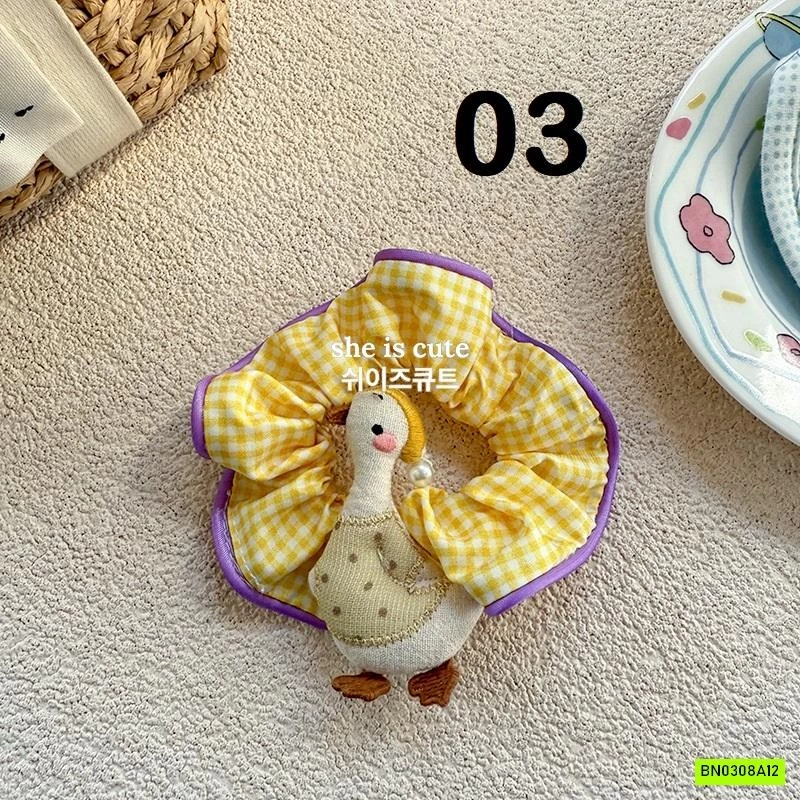 DÂY BUỘC TÓC CARO GẮN BÚP BÊ